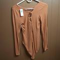 American Eagle Outfitters Tops | American Eagle Outfitters Long Sleeve Cinnamon Bodysuit Size M | Color: Cream/Orange | Size: M