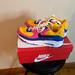 Nike Shoes | Kids Nikes. Size 7y. Barely Worn. | Color: Blue/Pink/Yellow | Size: 7g