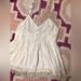 Free People Tops | Free People White Lace Floral Babydoll Ruffle Fringe Size 2 | Color: White | Size: 2