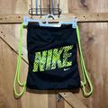Nike Accessories | Nike Draw String Backpack Black And Neon Green Lettering And Draw Strings | Color: Black/Green | Size: 17 1/2 In X 13 In