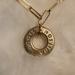Louis Vuitton Jewelry | Authentic Louis Vuitton Brass Grommet Circle Charm On A Necklace | Color: Gold | Size: Os