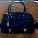 Coach Bags | Black Pat And Leather Wrist Bag Front Pocket And Pockets Inside | Color: Black | Size: Os