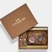 Coach Bags | Nib Boxed Mini Boxy Cosmetic Case & Hair Tie Set Signature C Disco Pat | Color: Brown/Tan | Size: 4 1/4" (L) X 3 1/4" (H) X 2" (W)