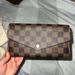 Louis Vuitton Bags | Louis Vuitton Damier Ebene Pattern Sarah Wallet | Color: Brown | Size: Os