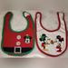 Disney Accessories | Disney Holiday Baby Bib Set Of Two | Color: Green/Red | Size: Osbb