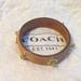 Coach Jewelry | Coach Leather Turnlock Bangle Bracelet | Color: Tan | Size: Os