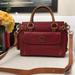 Dooney & Bourke Bags | Dooney & Bourke Tassel Pebbled Leather Handbag With Long Strap Womens Size M | Color: Red/Tan | Size: M