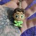 Disney Accessories | Disney Doorables Prince Naveem Keychain | Color: Brown/Green | Size: Os