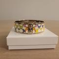 Coach Jewelry | Coach Multicolor Enamel Wide Bangle Bracelet | Color: Silver/White | Size: Os