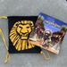 Disney Bags | Disney The Lion King Musical Drawstring Souvenir Bag And Book | Color: Black/Gold | Size: Os