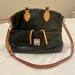 Dooney & Bourke Bags | Dooney & Bourke Leather Satchel, Black And Brown With Silver Hardware. | Color: Black | Size: Os