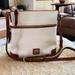 Dooney & Bourke Bags | Gorgeous Nwot Dooney & Bourke White Leather Double Zip Crossbody Bag | Color: Tan/White | Size: Os