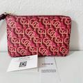 Coach Bags | Coach Corner Zip Wristlet With Coach Monogram Print Gold/Rouge. New With Tag | Color: Pink/Tan | Size: Os