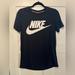 Nike Tops | 3/$10 Nike Black And White Swoosh Short Sleeve Tee Shirt, Size S | Color: Black | Size: S