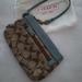 Coach Bags | Coach Wristlet In Signature Brown Jacquard Print/Baby Blue Leather | Color: Blue/Tan | Size: Os