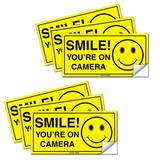 (Set of 6) Smile You re On Camera Sticker - 2 x 4 -Durable Self Adhesive 4 Mil Vinyl - Laminated - Fade & Scratch Resistant - Waterproof - Private Property No Trespassing Video Surveillance Sign