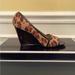 Michael Kors Shoes | Michael Kors Wedge Patent Leather Heel And Trim Animal Print Fur | Color: Black/Tan | Size: 8.5