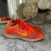 Nike Shoes | Neon Orange Nike Sneaker | Color: Orange | Size: 6