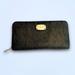 Michael Kors Bags | Michael Kors Jet Set Leather Oversized Wallet 9.25 X 4.5 Signature Logo | Color: Black/Brown | Size: Os
