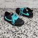 Nike Shoes | Kids Black & Teal Nike Jordan 1 Retro Low Os Sp Travis Scott Sneakers Sz 13c | Color: Black/Blue | Size: 13b