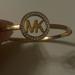 Michael Kors Jewelry | Michael Kors Mkj4116 710 Women Gold Tone Mk Crystal Logo Bangle Bracelet | Color: Gold | Size: Os
