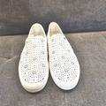 Michael Kors Shoes | Michael Kors White Floral 1/2" Platform Stretch Gore Perforated Kane Slip On | Color: White | Size: 7.5