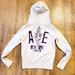 American Eagle Outfitters Tops | American Eagle Women's Cream Zip Up Hoodie Sweatshirt | Color: Cream/Purple | Size: M
