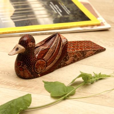 'Handmade Batik Duck-Shaped Pule Wood Door Stop in Warm Hues'