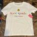 Kate Spade Tops | Kate Spade New York 100% Cotton White S/S T Shirt With Glitter Logo Size S Nwt | Color: White | Size: S