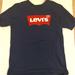 Levi's Shirts | Navy Blue Levi's T-Shirt. Size Medium In Mens, Size Large In Womens. | Color: Blue | Size: M