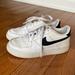 Nike Shoes | Nike Air Force 1 Low White Black Leather Unisex Sneaker Shoe - 3.5y Or W5.5 | Color: Black/White | Size: 3.5y Or W5.5