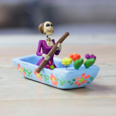 'Hand-Painted Catrina on a Boat Ceramic Figurine in Blue'