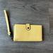 Coach Bags | Coach - Polished Pebble Leather Wallet Wristlet - Yellow | Color: Gold/Yellow | Size: Os