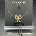 Coach Jewelry | Coach Rhinestone Bow Slider Bracelet | Color: Gold | Size: Os