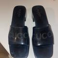 Gucci Shoes | Gucci Women's Rubber Slide Sandal Size 38 (Fits 7.5) | Color: Black | Size: 8