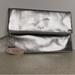 Victoria's Secret Bags | New Victoria's Secret Anniversary Silver Fold Over Angel Clutch Bag | Color: Silver | Size: Os