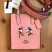 Coach Bags | Disney X Coach North South Mini Tote With Ice Skate Motif | Color: Gold/Pink | Size: Os