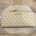 Michael Kors Bags | Jet Set Travel Large Logo Quarter-Zip Wallet New | Color: Cream/Gold | Size: Os