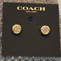 Coach Jewelry | Gorgeous Nwt Coach Open Circle Pink Stone Stud Earrings Encased In Gold Metal. | Color: Gold | Size: Os