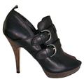 Coach Shoes | Coach Black Leather Alexia Peep Toe Bootie Heels | Color: Black | Size: 7