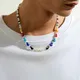 Collana girocollo corta con perle finte e perline colorate per uomo Catene di perline alla moda sul collo 2023 Accessori di gioielli di moda