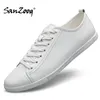Reine weiße Herrenschuhe, niedrige Leder-Turnschuhe, Freizeitschuhe für Jugendliche, Mode, Frühling,