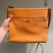 Coach Bags | Coach Pebble Leather Cross Body Bag With Pocket | Color: Orange/Silver | Size: Os