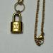 Louis Vuitton Accessories | Authentic Louis Vuitton Lock Charm On 20” Gold Plated Stainless Steel Chain | Color: Gold | Size: Os