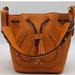 Dooney & Bourke Bags | Authentic Dooney & Bourke Orange Leather Western Horseshoe Drawstring Bucket Bag | Color: Orange | Size: Os