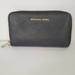 Michael Kors Bags | Michael Kors Black Saffiano Leather Zip Around Wallet Medium Phone Clutch 7x4 | Color: Black | Size: Os