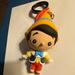 Disney Accessories | Disney Pinocchio Backpack Accessory/Keychain | Color: Red/Tan | Size: Backpack/ Keychain
