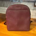 Michael Kors Bags | Maroon Leather Michael Kors Backpack Bag With Mild Wear And Tear On Handle | Color: Purple | Size: Os