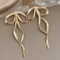 Anthropologie Jewelry | New~ Bow Wavy Earrings | Color: Gold/Silver | Size: Various