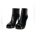 Tory Burch Shoes | Cap-Toe Ankle Bootie In Black, A Stunning Mix Of Matte And Patent Leathers | Color: Black/Gold | Size: 7.5